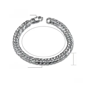Detail of high polished 8mm silver Cuban link bracelet in fine steel showing the secure clasp