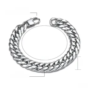 Macro detail of 14mm silver polished stainless steel Cuban link bracelet for men