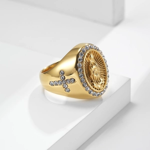 Close-up of 18K gold plated ring with Virgin Mary relief and crystal cross details