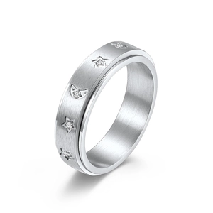 Brushed titanium steel spinner ring with stars and moon engravings for anxiety relief