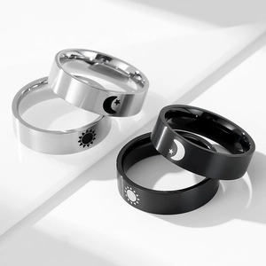 Matte black and silver titanium steel couple rings with sun moon and star engravings