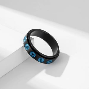 Rotating stainless steel anxiety ring with blue smiley face pattern in black finish