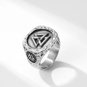 Detailed close-up of vintage Viking Valknut signet ring with rustic hammer texture finish