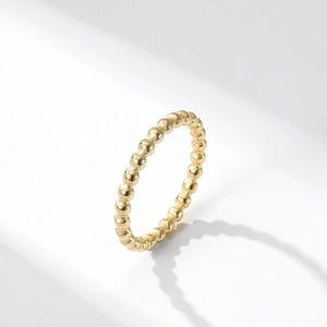 Minimalist stackable gold beaded ring for women featuring small polished titanium steel spheres