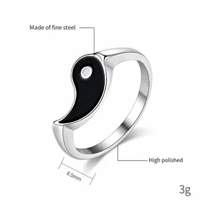 Detail view of 8.5mm stainless steel Yin Yang ring showing polished finish and black inlay