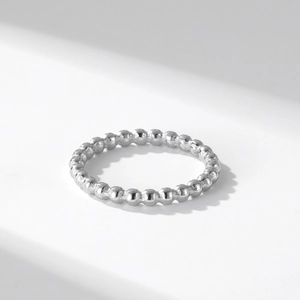 Minimalist silver beaded stackable ring with polished stainless steel spherical spheres