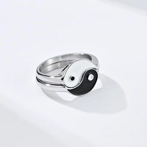 Minimalist Yin Yang stainless steel ring set with black and white enamel pattern