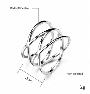 Detailed macro view of high polished stainless steel double cross minimalist ring