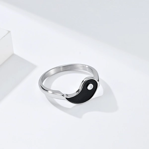 Minimalist stainless steel Yin Yang Tai Chi open ring for men and women on white blocks
