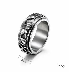 Detailed view of 8mm rotatable stainless steel ring with ancient Egyptian relief patterns