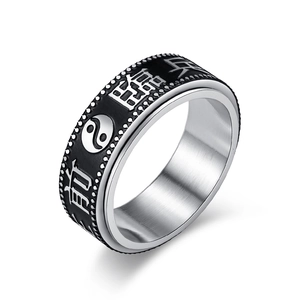 Vintage spinner ring with Tai Chi symbols and Chinese characters in brushed stainless steel