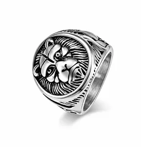 Detail view of lion head steel ring showing 22mm width and engraved texture