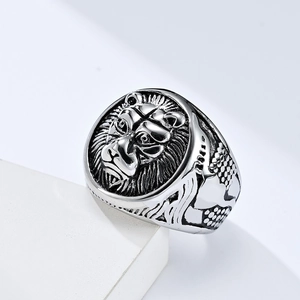 Macro shot of retro stainless steel lion head ring showing intricate relief details