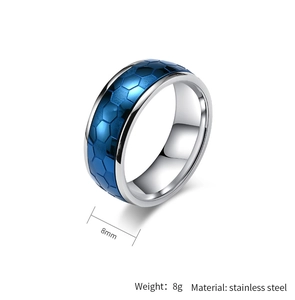 Détail d'une bague rotative en acier inoxydable de 8mm avec motif en nid d'abeille bleu