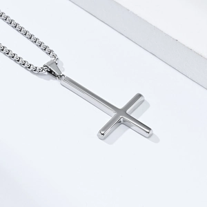 Polished silver inverted St. Peter cross necklace on a minimalist bead chain
