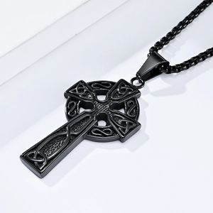Detail of black stainless steel Celtic knot cross pendant with textured box chain