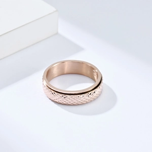 Anello girevole unisex in acciaio al titanio oro rosa con motivo a rombi taglio diamante