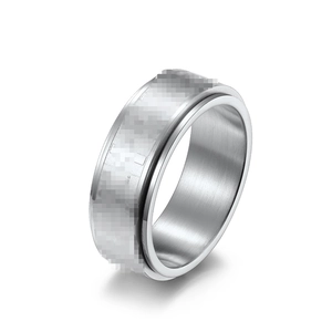 Brushed stainless steel spinner ring with a rotating band for stress relief and anxiety