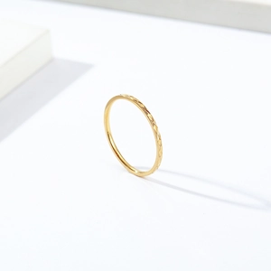 Minimalist 1mm diamond pattern titanium steel ring with elegant 18K gold finish stackable design