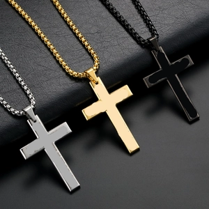 Three stainless steel cross pendant necklaces in silver gold and black with box chains