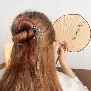 Elegant bamboo-style U-shaped hair stick with green beaded tassels in Chinese style