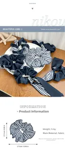 Navy blue and striped oversized fabric scrunchie set showing 17.5cm diameter and 9.4g weight