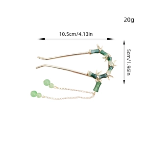 Elegant gold bamboo hairpin with jade-like beads and tassel pendant for women