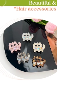 Detailed set of five colorful acetate cat-shaped hair clips with sparkling heart gems