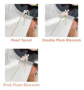 Detail of elegant Chinese hair sticks featuring plum blossoms and pearl tassels