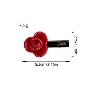 Elegant red rose acetate hair clip with dimensions 5.5cm by 3cm and 7.5g weight