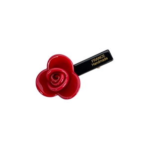 Handmade red acetate rose flower hair clip with golden France engraving on black base