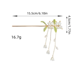 Elegante fermaglio per capelli mughetto con nappe di perle e decori floreali bianchi