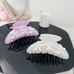 Elegant marble resin hair claws with pearl flowers and rhinestones in purple and white
