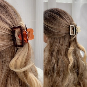 Pinces à cheveux en acétate avec motif cœur en ambre et beige pour coiffures chic
