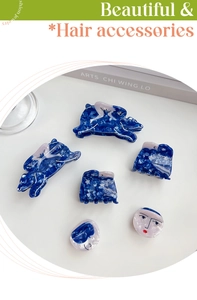 Artistic blue marble acetate hair claw clip set with creative abstract design patterns