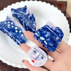 Artistic blue star-pattern marble claw clip and purple face-design acetate hair accessories