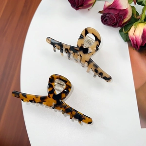 Set of two tortoiseshell acetate hair claws in dark coffee and light honey shades