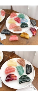 Detail of colorful marble pattern acetate hair claws with strong grip design