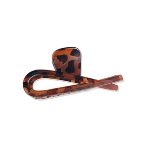 Pince à cheveux élégante en résine motif léopard avec finition mate et design ergonomique