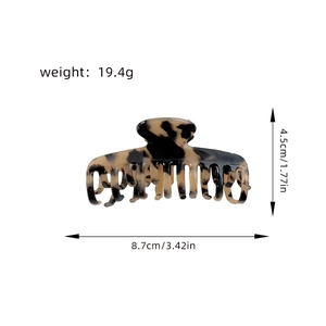 Tortoise shell pattern hair claw clip with dimensions 8.7cm and 19.4g weight details
