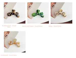 Detail view of small acetate bow hair claws in tortoiseshell and marble patterns