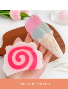 Detail of pink ice cream cone hair claw clip and swirl pattern acetate hair accessory