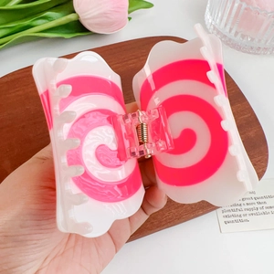Pink and white swirl acetate hair claw clip with golden spring for women