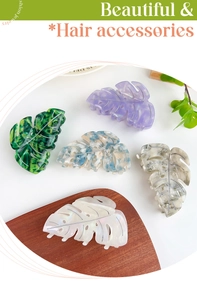 Detailed monstera leaf hair claw clips made of premium marbled acetate in various colors