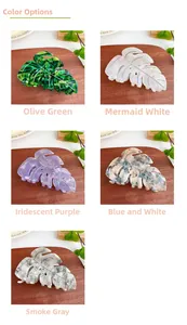 Monstera leaf hair claws in five colors including olive green and mermaid white