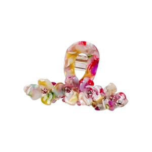 Three-petal floral cellulose acetate hair claw with pink rhinestones on white background