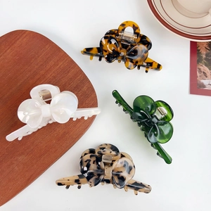 Elegante Haarklammern aus Acetat mit Schleife in Perlmutt und Schildpatt-Optik, 4er Set