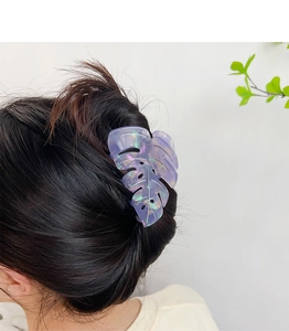 Detail of large purple acetic acid leaf hair claw clip with laser texture and vein design