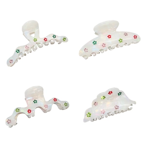 Set of four iridescent pearl hair claws with colorful rhinestone flower patterns