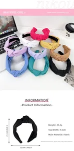 Detail showcasing eight solid color knotted wide headbands with dimensions and fabric texture